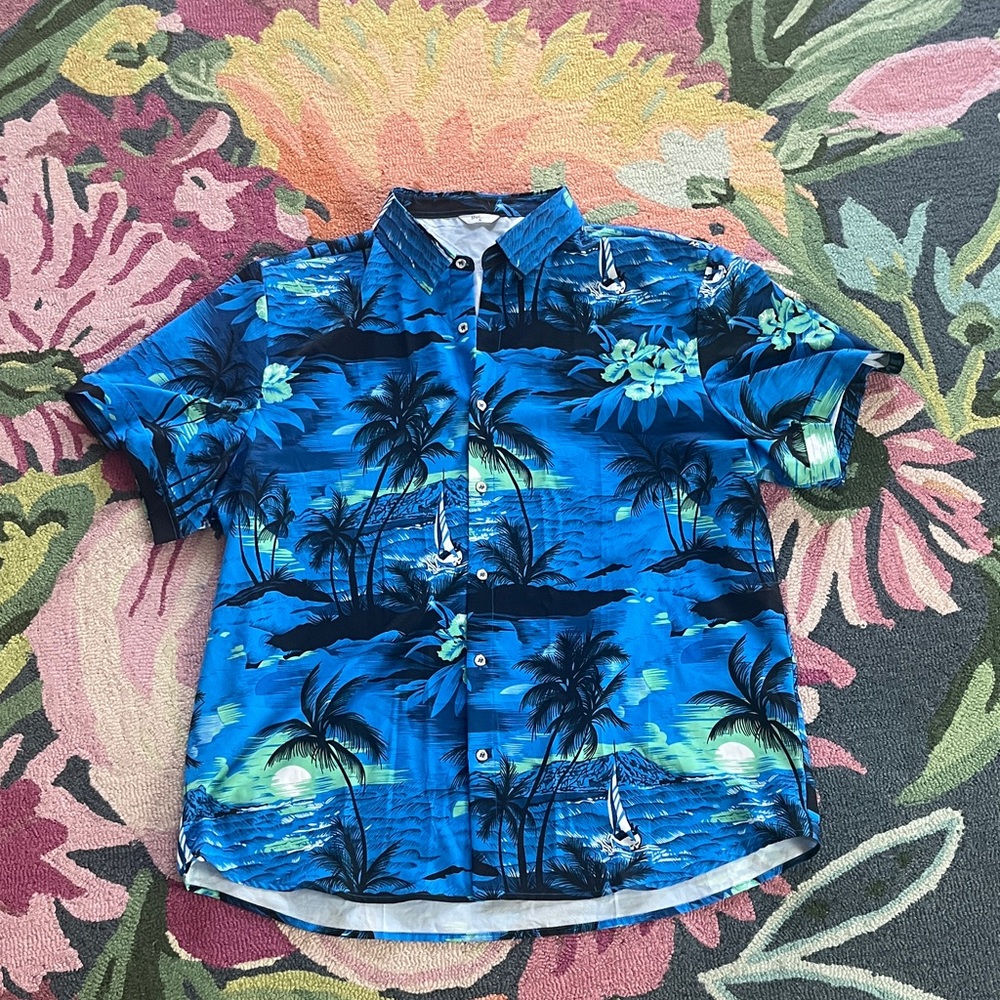 Hawaiian blue button up shirt. 95% polyester 5% spandex